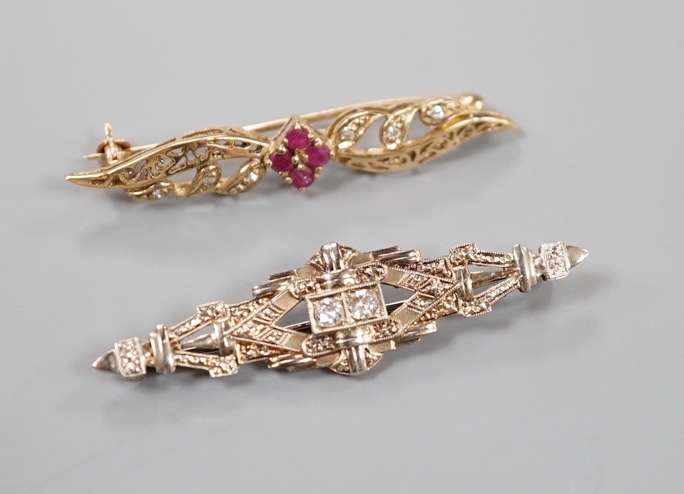 A modern 375, ruby and diamond chip set bar brooch, 44mm, gross 2.8 grams and an Austro Hungarian bar brooch.